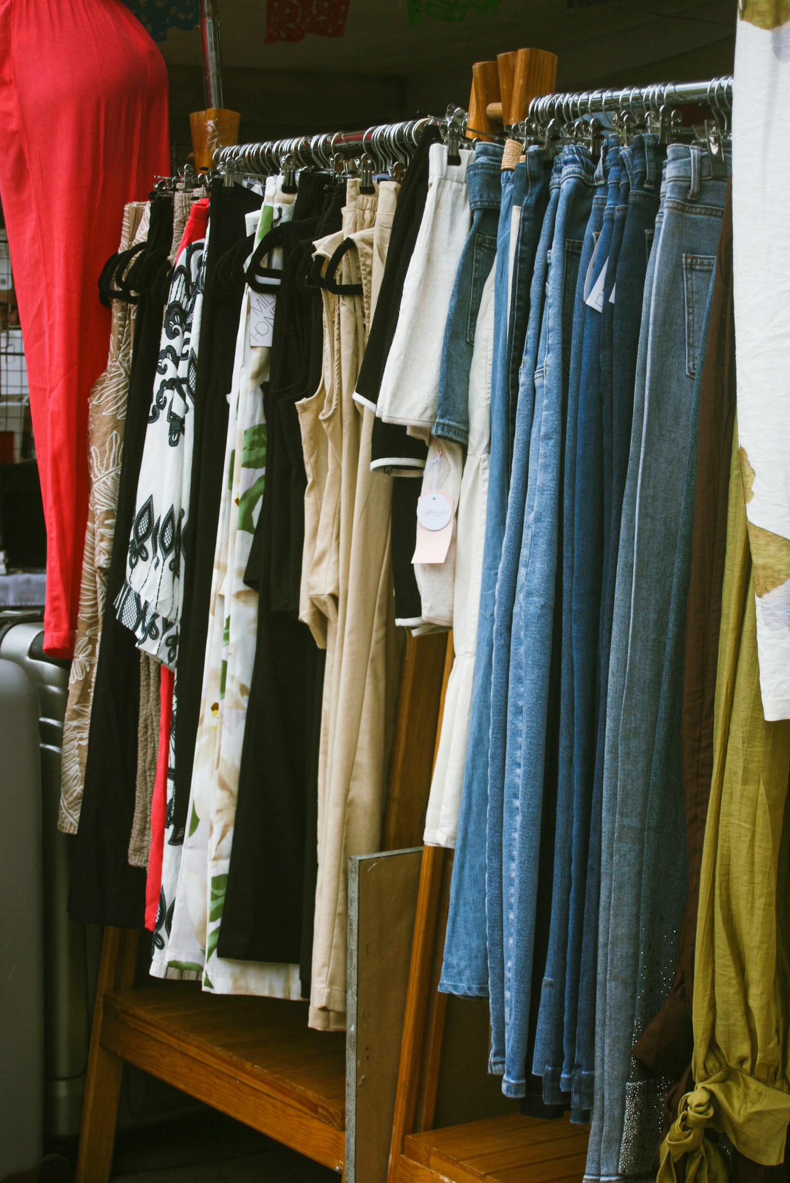 Assorted boutique clothing on a rack